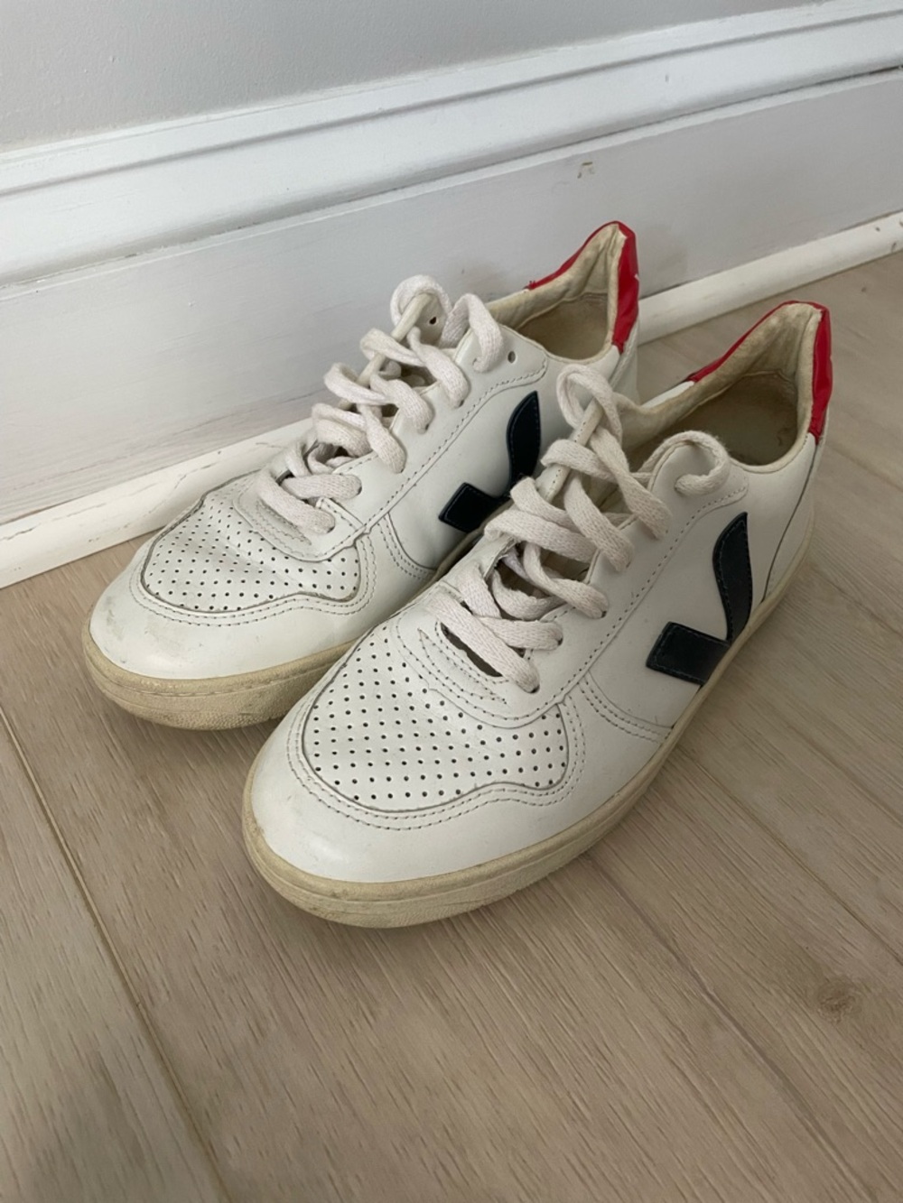 Veja White Leather Sneakers with Blue 'V' Accent and Red Heel lightly used